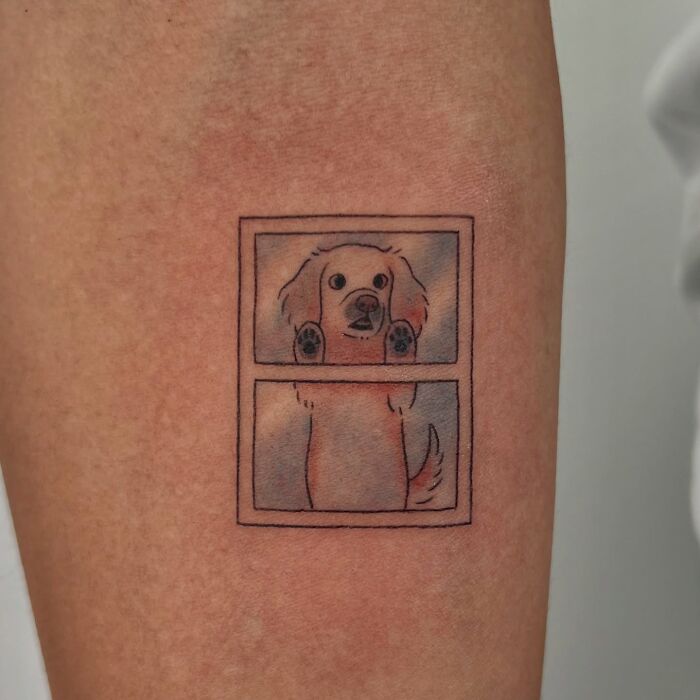 Minimalist dog tattoo with soft shading and clean lines, part of adorable frog and animal tattoos by Korean artist Buoy.