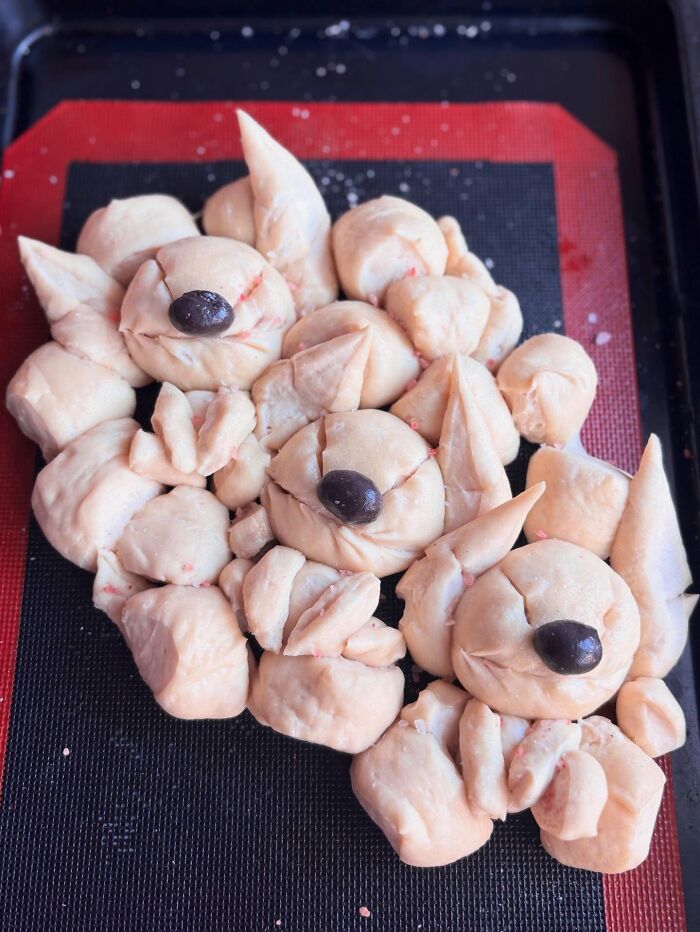 Creative meals for kids by a mom from Japan featuring adorable animal-shaped bread with olive eyes and rosemary garnish.