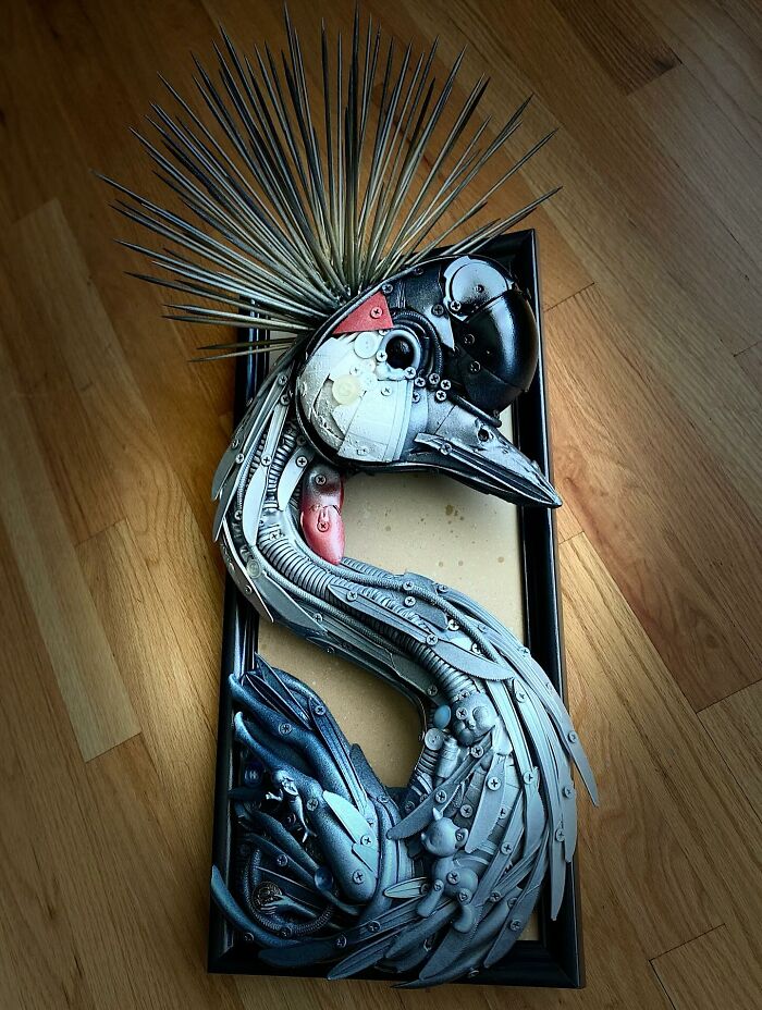 Intricate animal sculpture made from recycled trash and metal parts showcasing creative transformation and artistic craftsmanship.