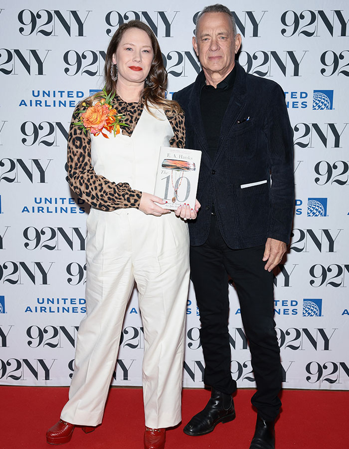 Two celebrities posing on a red carpet event backdrop, highlighting raw and unfiltered confessions celebs shared in memoirs.