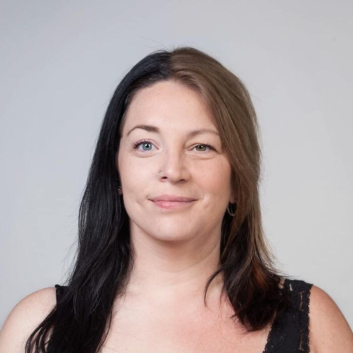Woman with half black and half brown hair, depicting a genetic portrait highlighting strong family DNA traits.