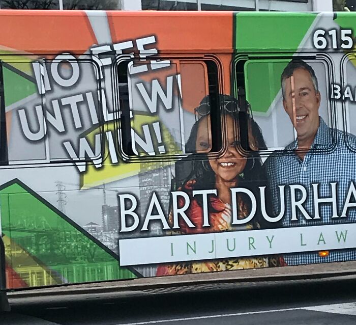 Bus advertisement with overlapping text and images causing a confusing advertising placement fail that makes people laugh.