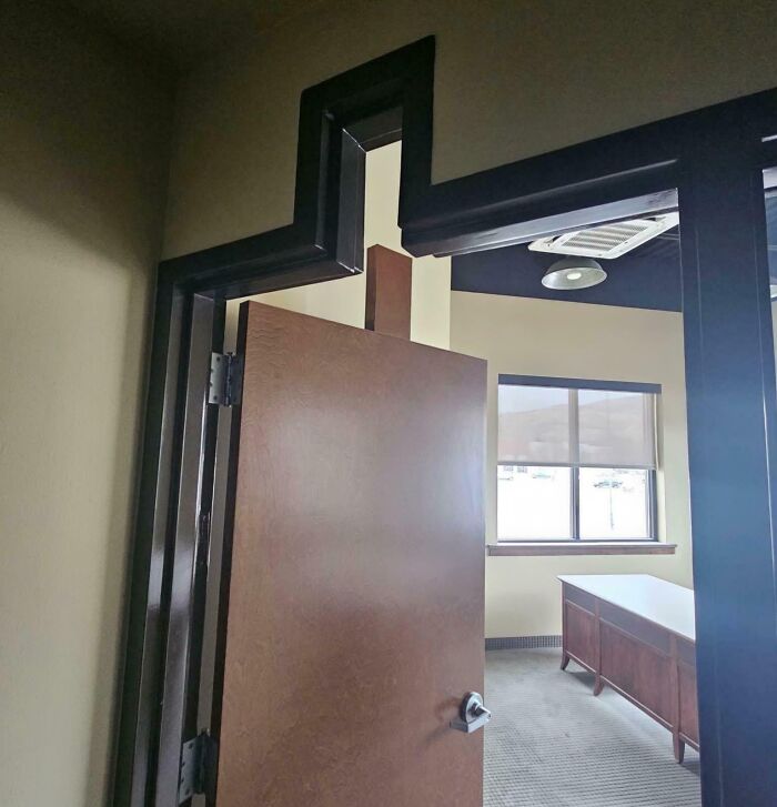 Poorly done job showing a crooked door frame and misaligned door in a hilariously bad job example.