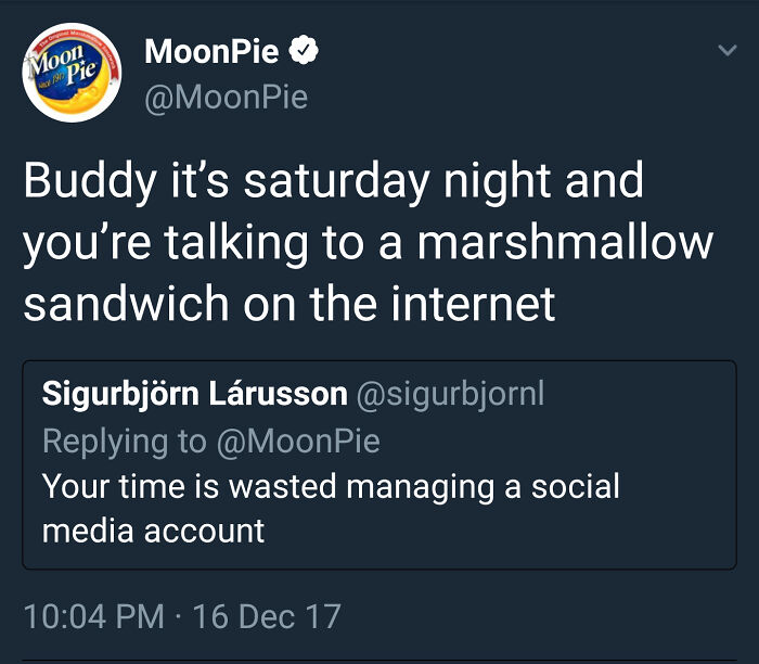 Tweet by MoonPie delivering a brutal comeback to a critic, showcasing sharp humor in business social media responses.
