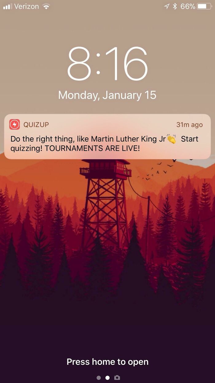 Phone lock screen showing a controversial social media notification from QuizUp, illustrating companies that failed miserably on social media.