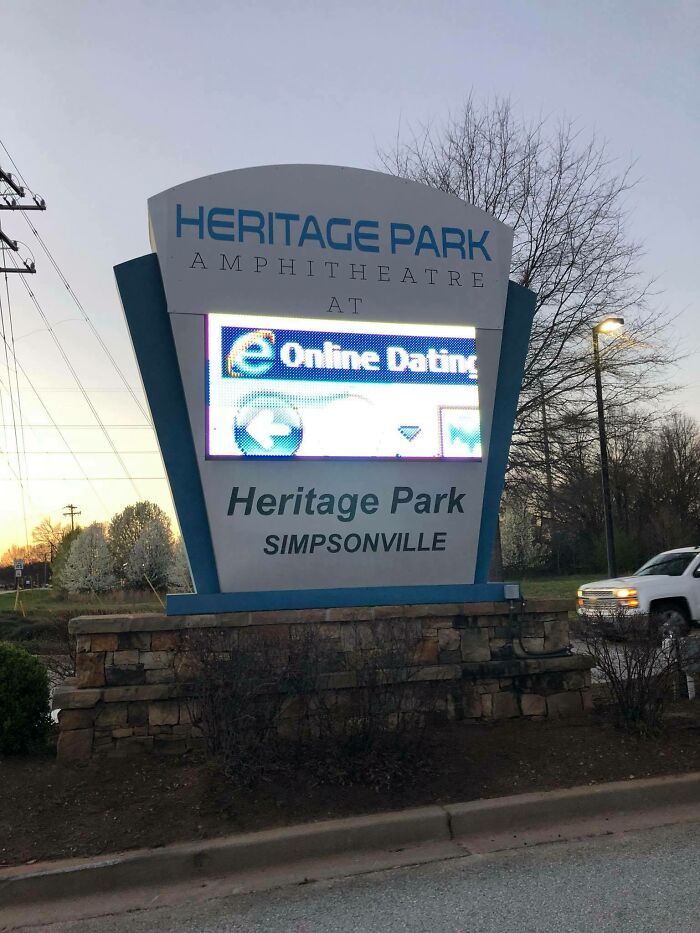 Heritage Park amphitheatre digital sign showing a social media fail with a distorted online dating message.