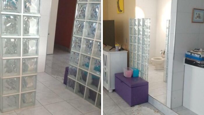 Poorly installed glass block partition in a tiled room showing hilariously bad jobs done quickly and carelessly.