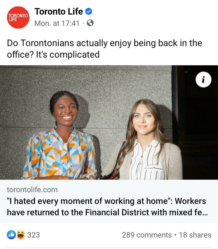 Two women standing and smiling in an office setting, illustrating parts of working in 2025 that are a nightmare.