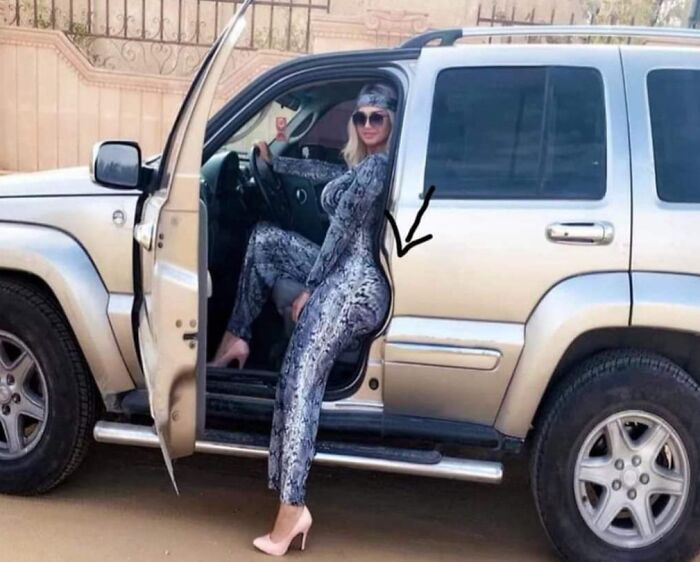 Woman in snakeskin outfit posing by car door with distorted vehicle shape illustrating Photoshop fails humor.