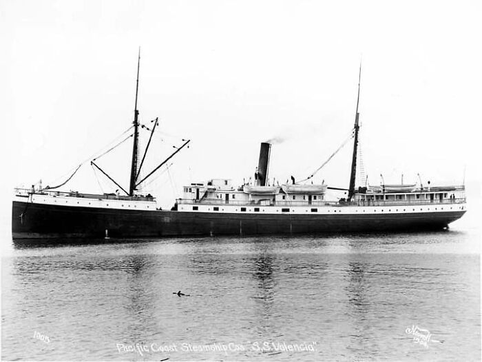 Black and white photo of the historic steamship S.S. Valencia on calm water, a terrifying photo from maritime history.