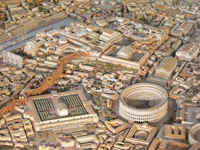 Detailed scale model of an ancient city representing urban hell concepts with dense buildings and historic architecture.