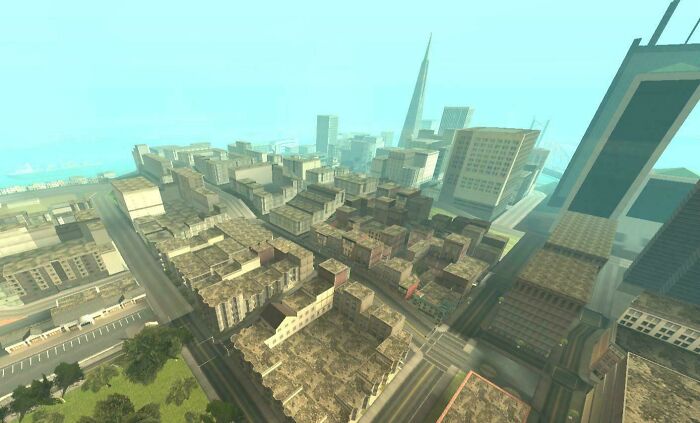 Aerial view of an urban area with dense buildings and roads, illustrating the urban hell echo chamber concept.