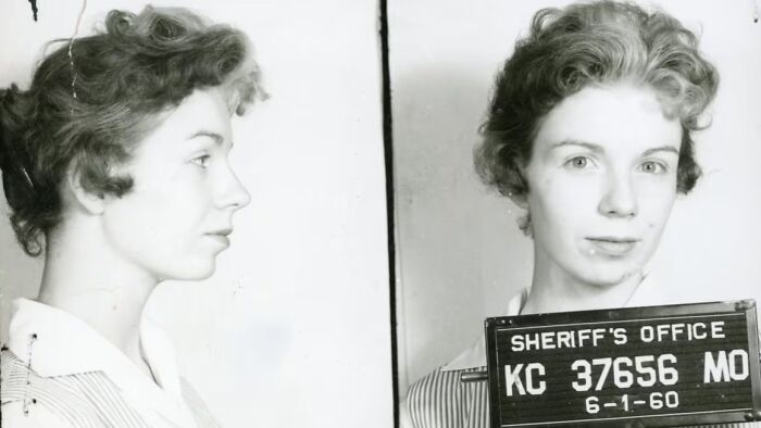 Black and white mugshot photo of a young woman from 1960, illustrating terrifying photos and stories with a scary vibe.