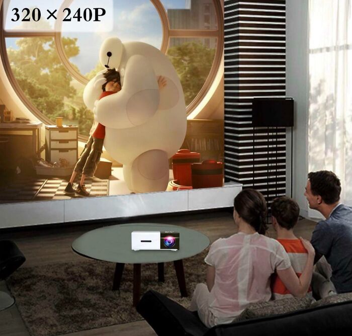 Family watching animated movie on TV with visible Photoshop fails creating distorted image and screen artifacts.