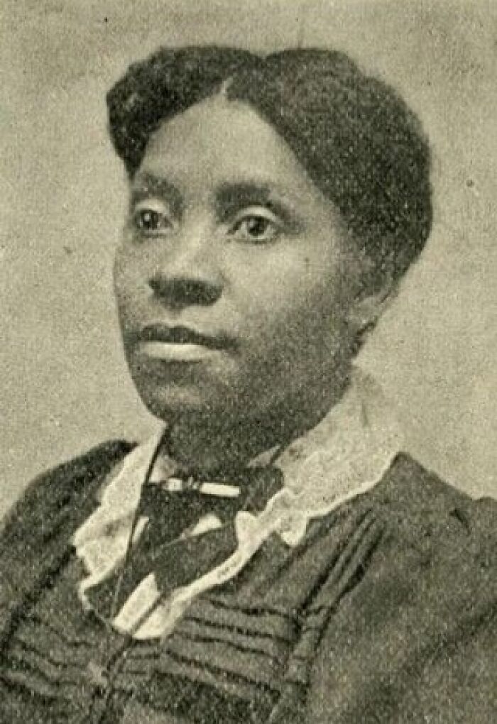 Portrait of a historical woman in vintage attire, illustrating key history anecdotes from the past in black and white.