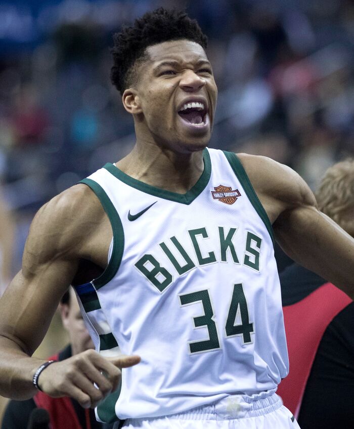 Milwaukee Bucks basketball player celebrating during a game, representing highest paid athletes in 2025.