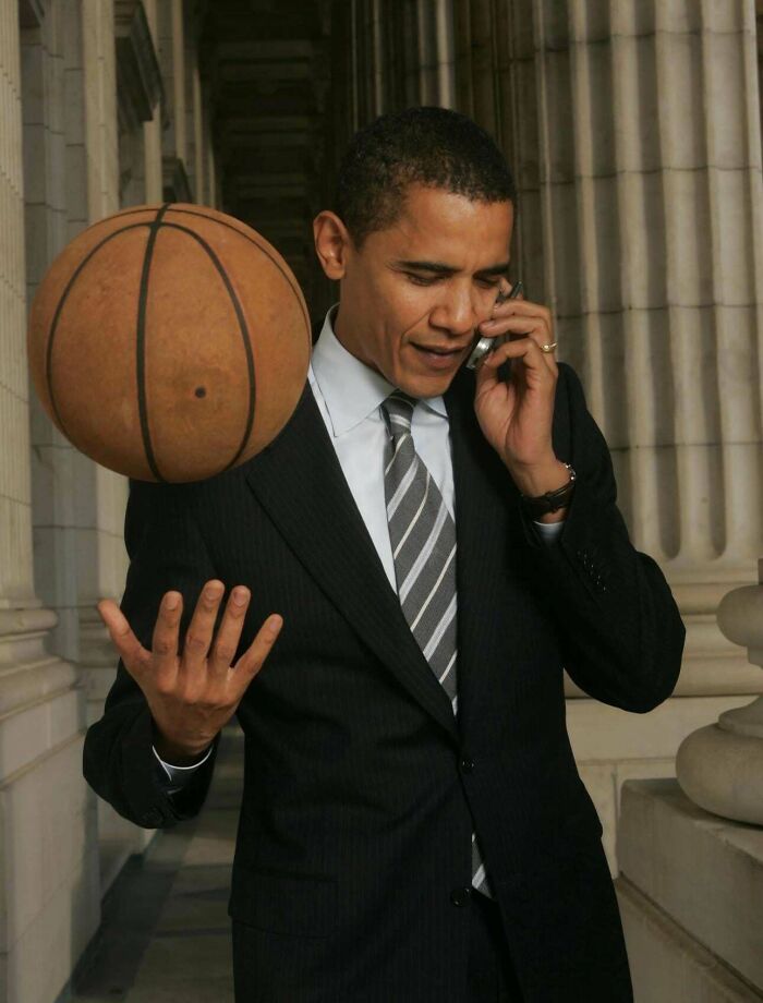 Man in a suit juggling a basketball and talking on the phone, illustrating random comparisons that mess with perception of time.