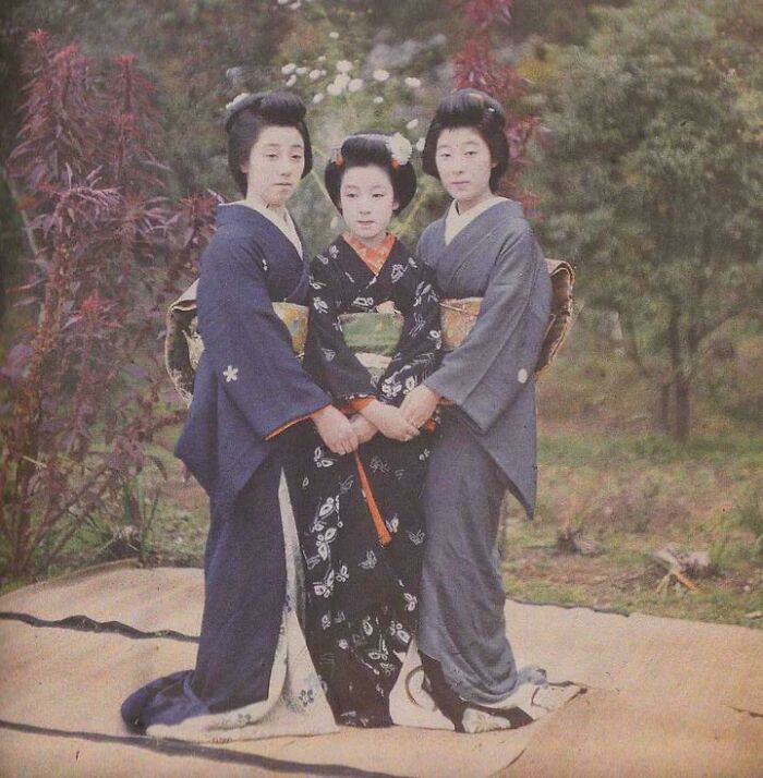 Three women in traditional kimonos posed outdoors, illustrating random comparisons that alter perception of time.
