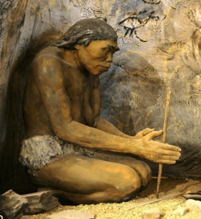 Reconstruction of an early human figure depicting prehistoric life for time perception comparisons.
