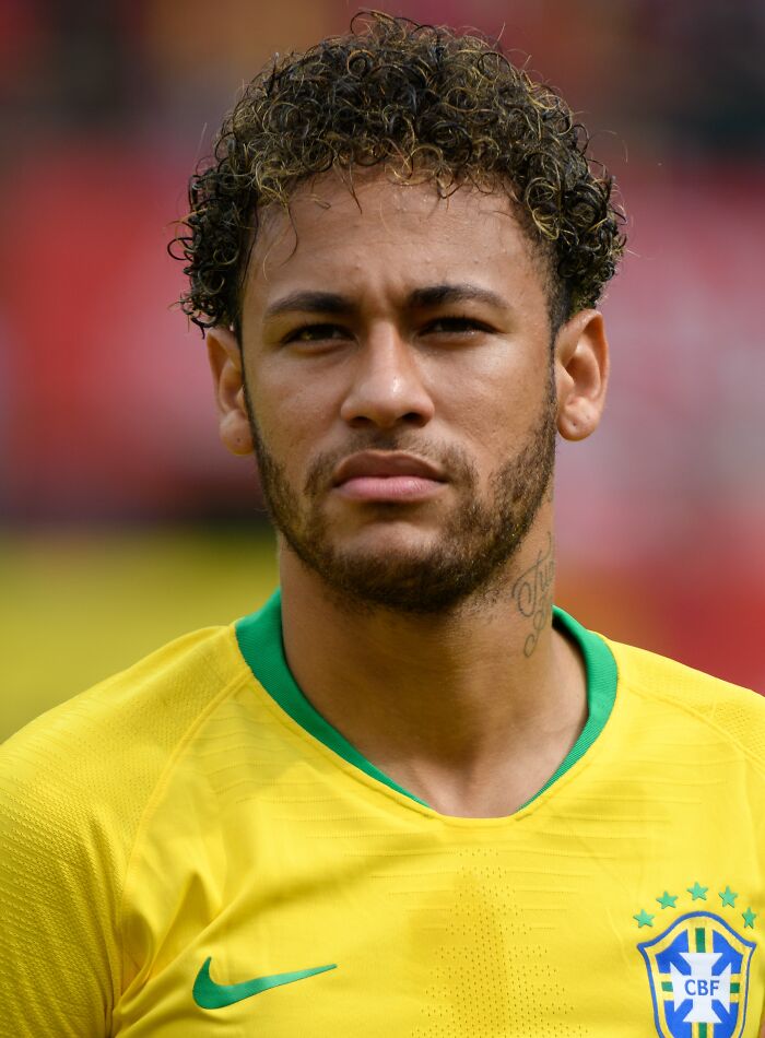 Close-up of a male athlete in a yellow Brazil jersey, representing one of the highest paid athletes of 2025.