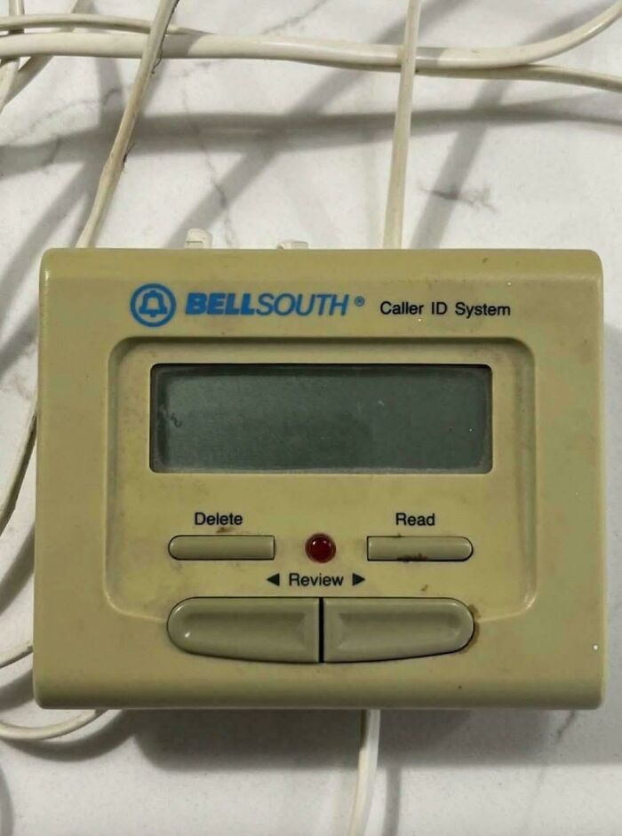 Vintage BellSouth caller ID system device with buttons and screen, evoking nostalgia to feel old as heck.