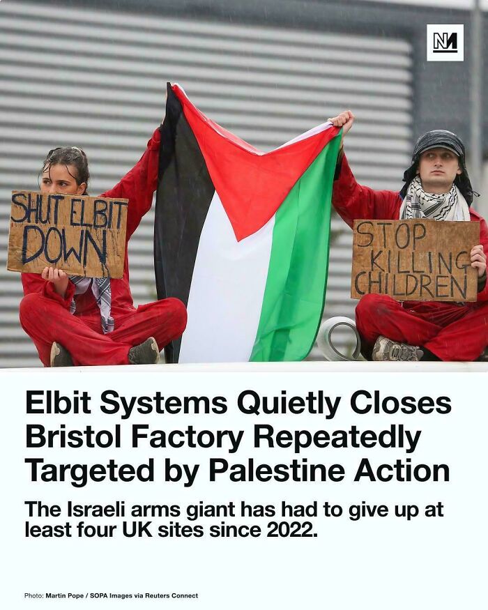 Protesters holding Palestine flag and signs during an attempt to shut down Elbit Systems factory amid targeted actions.