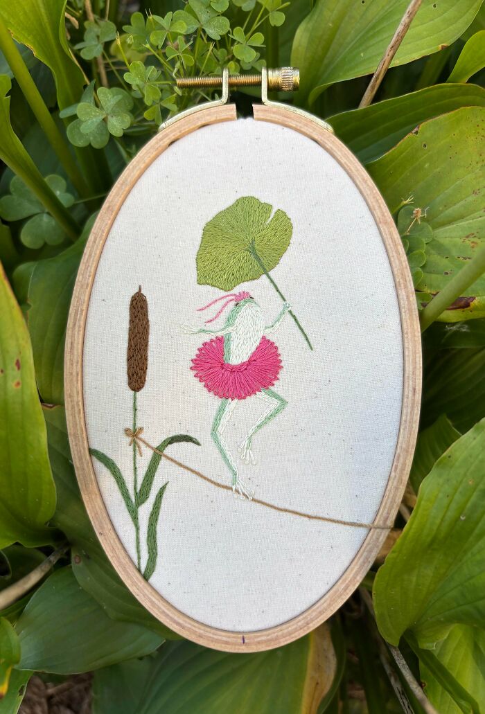 Charming embroidery creations depicting a frog in a pink tutu balancing on a tightrope, showcasing a fun hobby.