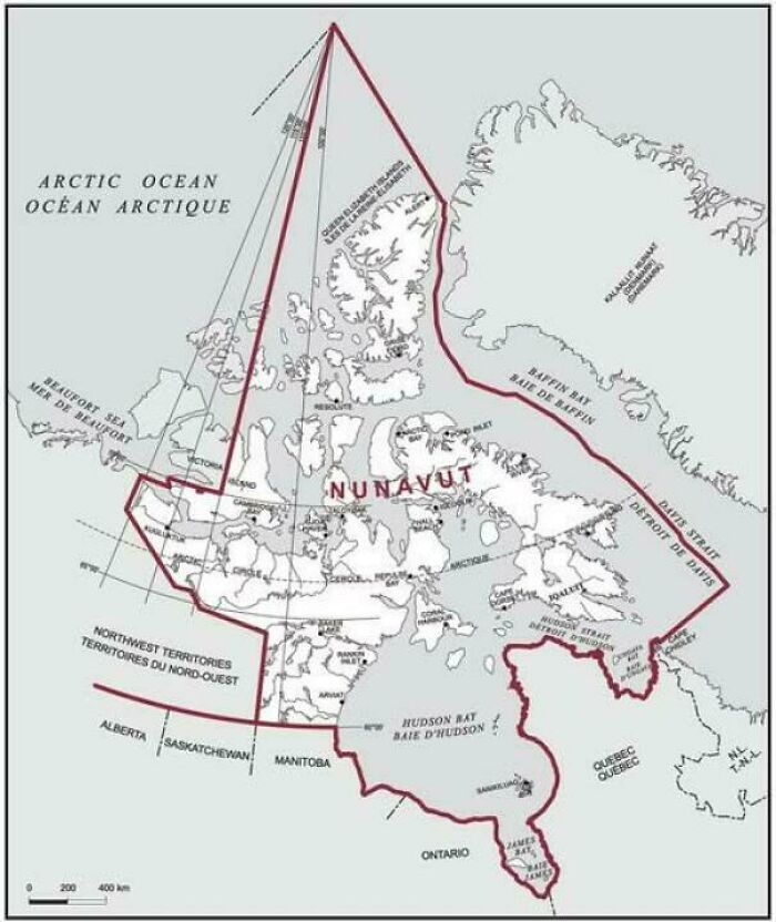Map of Nunavut and surrounding Canadian territories showing Arctic Ocean and major bays, part of informative maps collection.