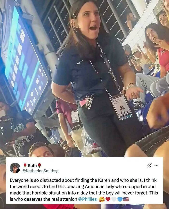 Woman in stadium with lanyard and badge, praised for chaotic good act that made a memorable positive impact on a boy.
