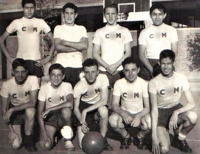 Group of men in matching sports uniforms posing on outdoor court with basketball, illustrating uniform wearing moments.