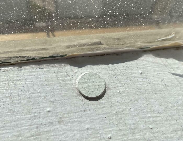 Close-up of a c*****d windowsill seal showing poor maintenance by landlords in a rental property problem.