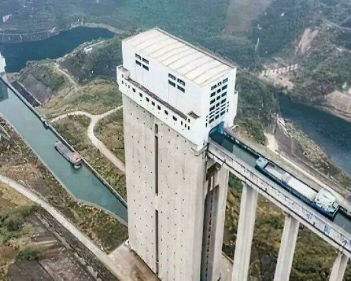 An eerie, extremely large modern structure conveying boats over a great height, a testament to complex engineering.
