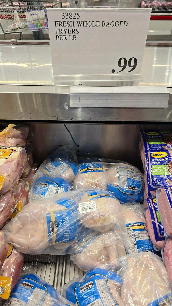 Fresh whole bagged fryers in plastic packaging at a grocery store, showcasing easy tricks to change your kitchen game.