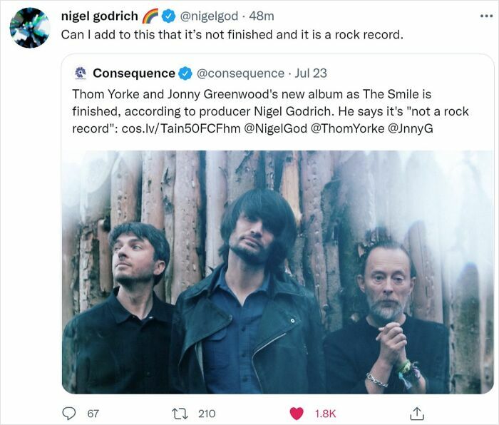 Tweet showing a music producer confidently stating a new album is not a rock record, illustrating embarrassing wrong confidence.