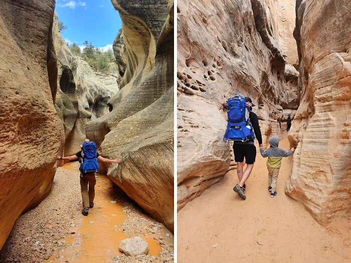 Dad hiking through narrow canyon with child, showcasing wholesome parenting moments in nature and outdoor adventure.