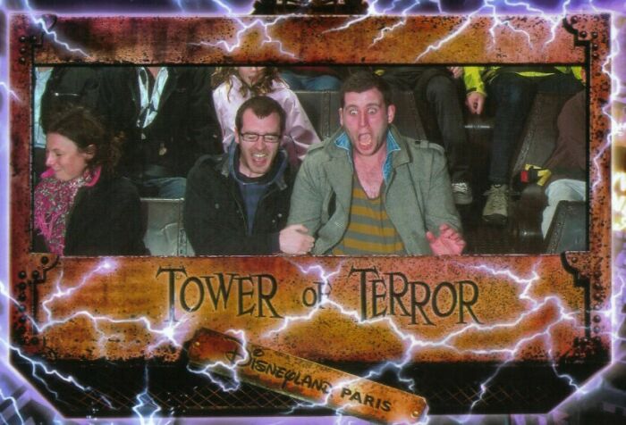 Thrilled and scared riders captured in a Tower of Terror ride photo from a memorable amusement park visit.