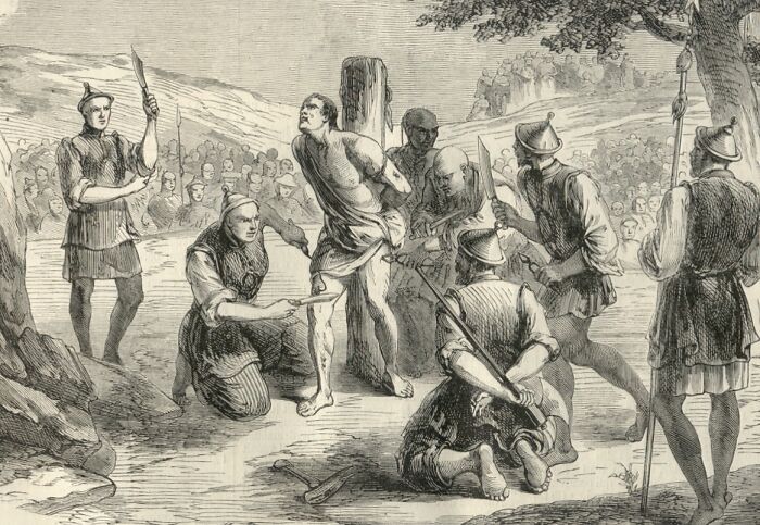 Medieval t*****e methods depicted in a historical engraving showing a bound man facing brutal interrogation by armored guards.