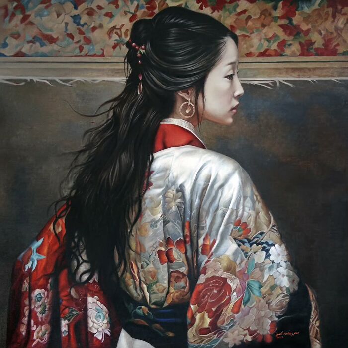 Painting of an Asian woman in a colorful traditional robe, celebrating women’s strength and beauty across cultures.