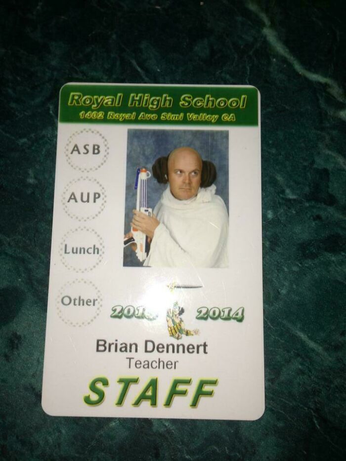 Teacher ID badge for Brian Dennert from Royal High School showing a humorous photo with a toy gun and costume for funny teachers.