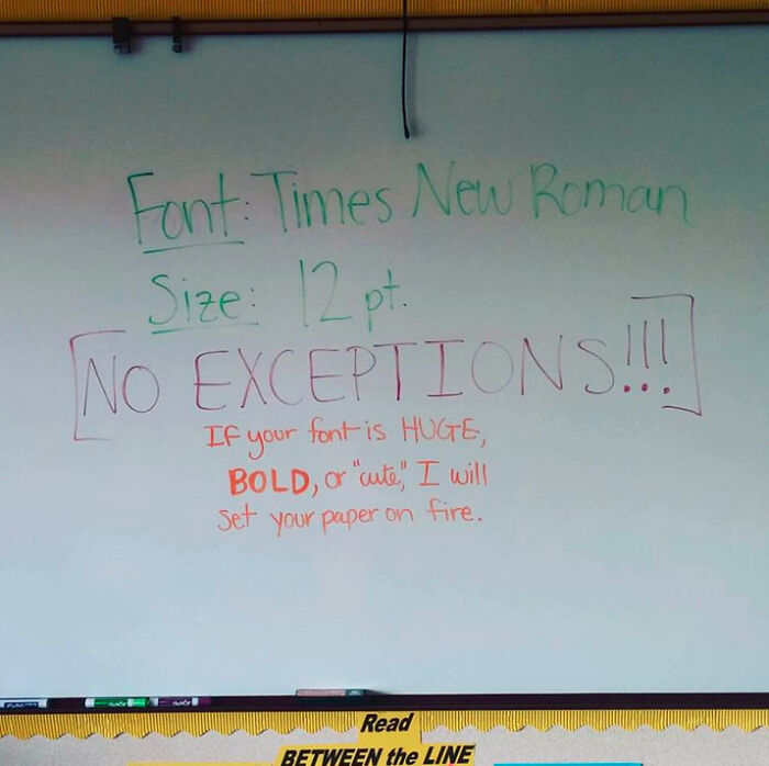 Whiteboard with funny teacher's rules about font size and style, showcasing humor that earns teachers an A+ for sense of humor.