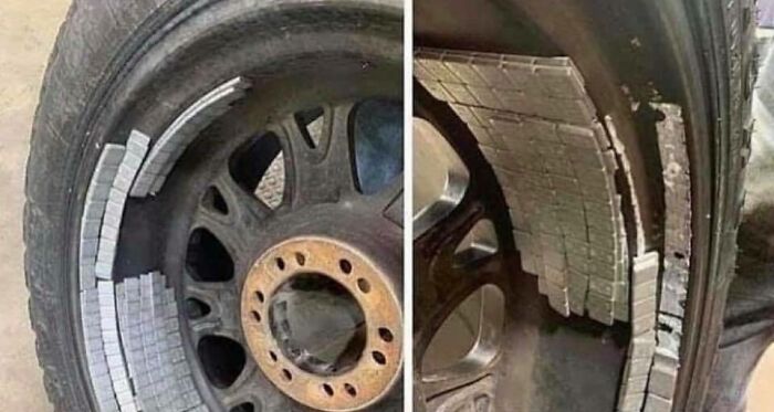 Car mechanic finds absurd makeshift tire repair using numerous nails inside the wheel rim during vehicle maintenance.