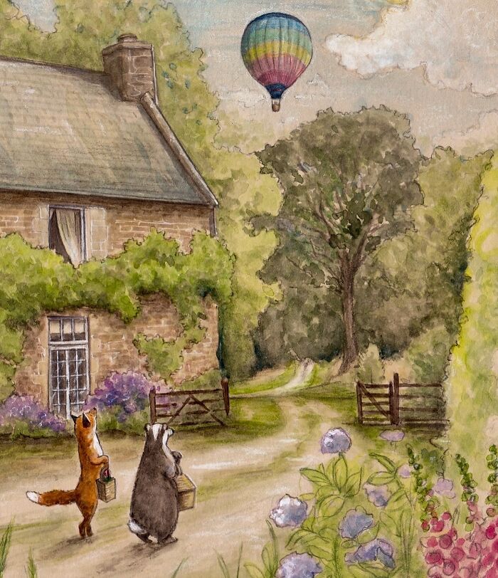 Wholesome animal illustrations of a fox and badger near a countryside cottage with a hot air balloon overhead.