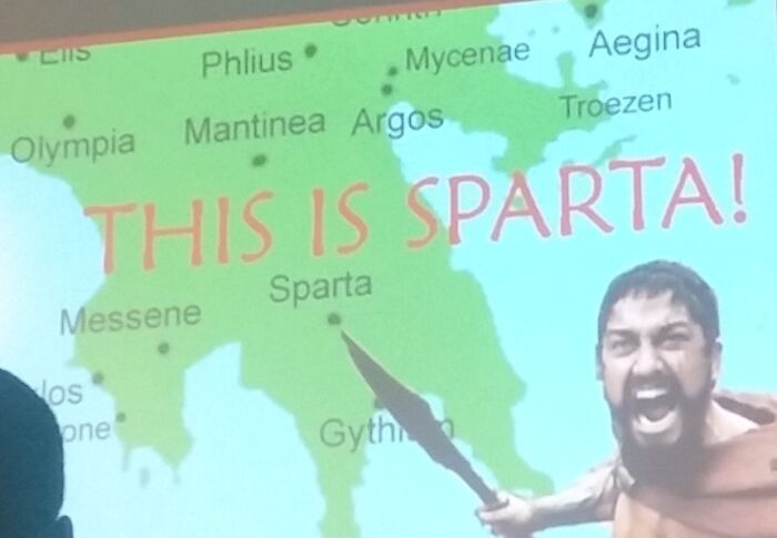 Map of ancient Greece with the phrase THIS IS SPARTA and a teacher dressed as a Spartan warrior for funny teachers humor.