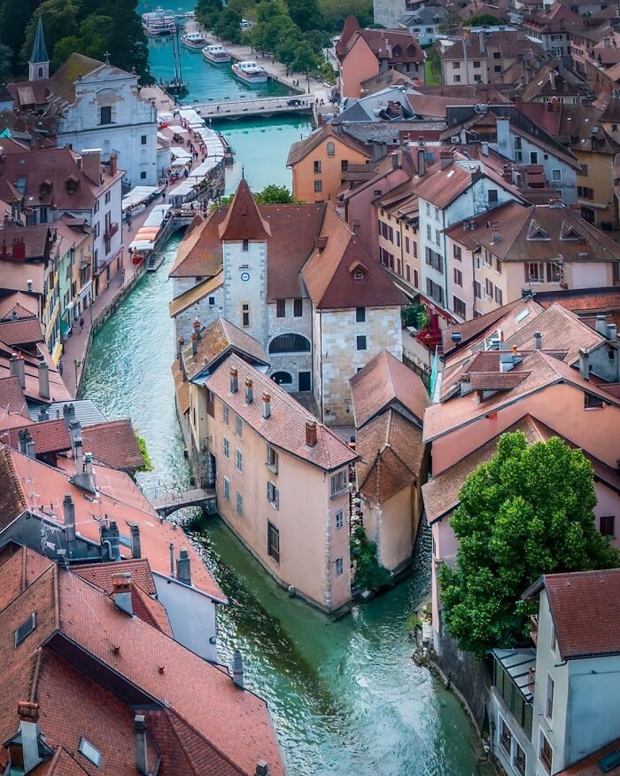 Aerial view of Annecy, France, showcasing beautiful architecture and a river winding through the town.