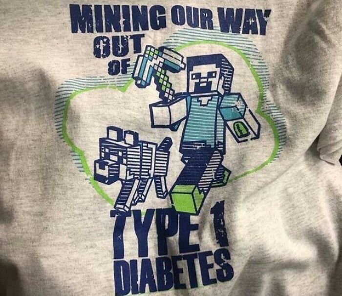 T-shirt with pixelated character and text about mining a way out of type 1 diabetes, showcasing wholesome and cringe-worthy creativity.