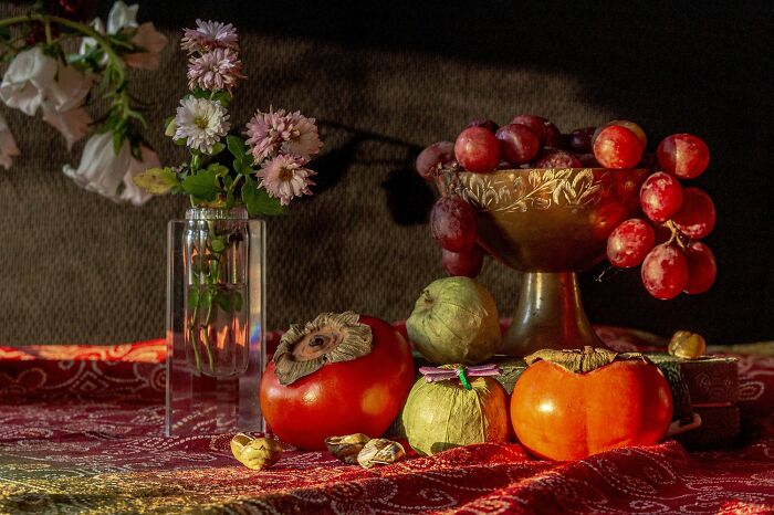 Still life with fruits and flowers showcasing stunning aerial color photography capturing Earth’s hidden patterns.