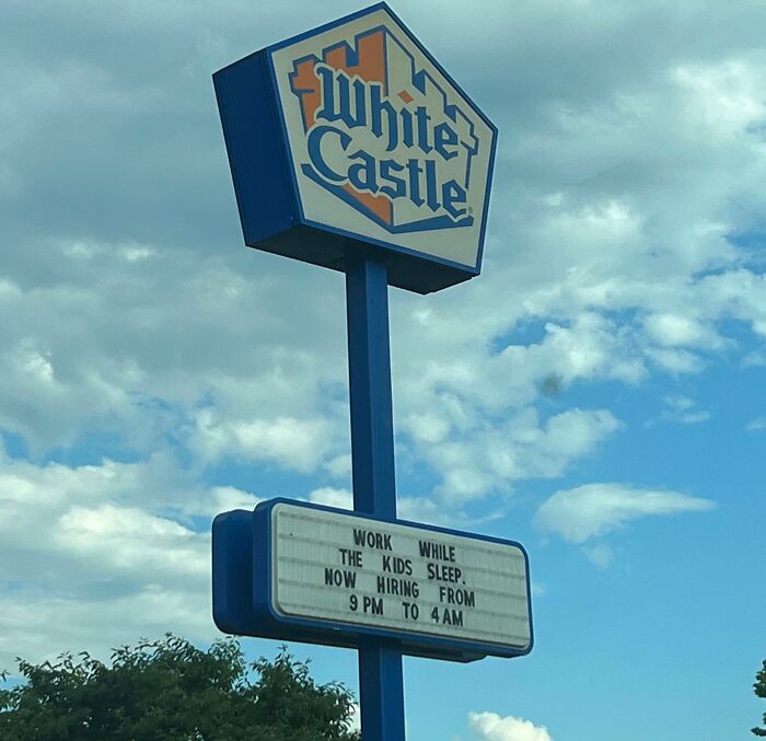 White Castle sign advertising midnight shift jobs highlighting dystopian real-life scenes in the US.