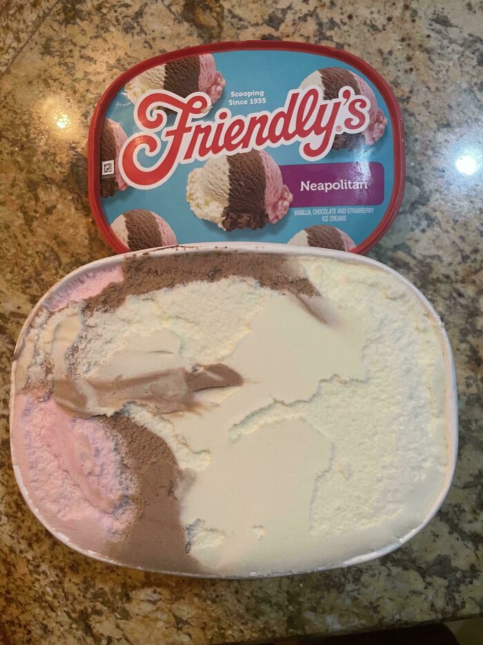Container of Friendly's Neapolitan ice cream showing unevenly distributed flavors, illustrating purchase based on picture versus reality.