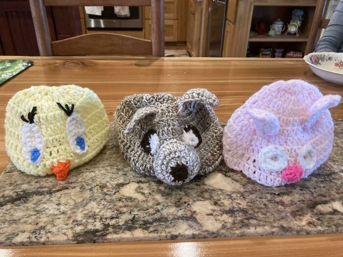 Three handmade crochet animal hats for babies, showcasing moms being their amazing wholesome selves creativity.