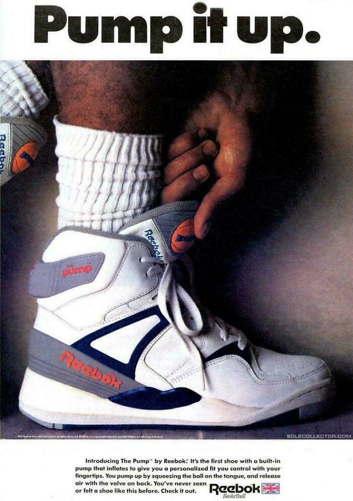 Close-up of a person inflating a classic 90s Reebok Pump sneaker, evoking funny 90s childhood memories.